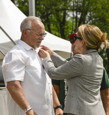 U.S._Representative_Madeleine_Dean_PA-4_presents_a_Vietnam_Veteran_Lapel_Pin_during_the_Welcome_Home_Opening_Ceremony
